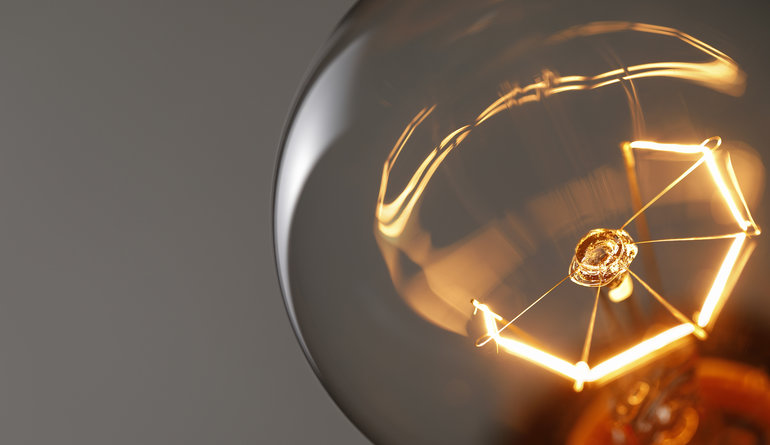 Close up of a lightbulb giving light