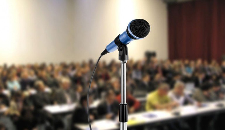 Microphone in front of a crowd
