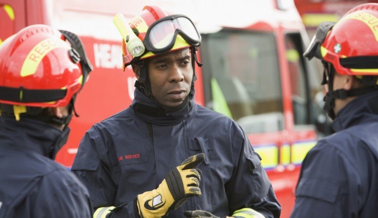 Three firemen talking