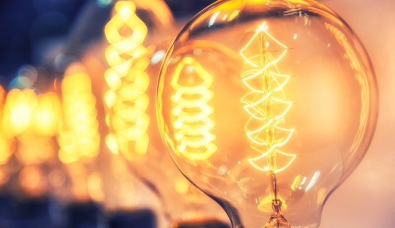 Close up of a lightbulb giving light