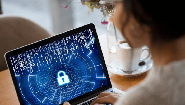 Woman on laptop with the screen locked