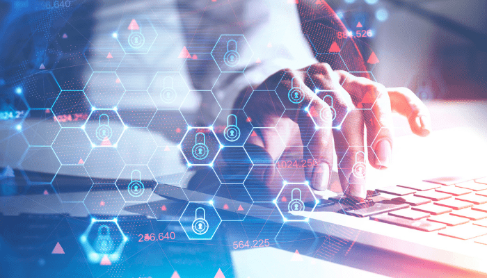 Person typing on laptop